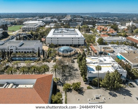Aerial panorama view of San Diego State University, accredited public higher education institution with centennial plaza, aztec student union, health and human sciences college, love library,  Royalty-Free Stock Photo #2448499745