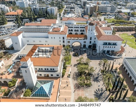 Aerial panorama view of San Diego State University, accredited public higher education institution with centennial plaza, aztec student union, health and human sciences college, love library,  Royalty-Free Stock Photo #2448499747