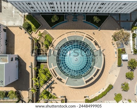 Aerial panorama view of San Diego State University, accredited public higher education institution with futuristic love library round entrance  Royalty-Free Stock Photo #2448499905
