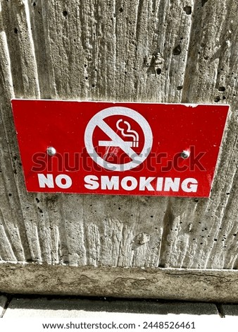 A sign no smoking at public area