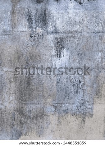 a photography of a fire hydrant sitting on top of a cement wall.