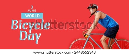 Young man riding bicycle on red background. Banner for World Bicycle Day