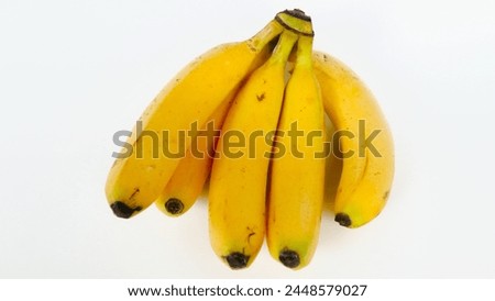yellow banana on white isolated background.