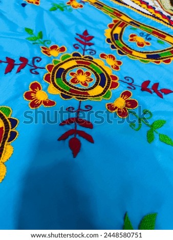 Exquisite embroidery elevating cloth with intricate designs, blending tradition with modern elegance in every stitch.