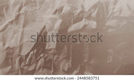 Brownish corrugated cardboard texture background. Brownish paper cardboard with a soft color. Brownish corrugated cardboard texture is useful as a background. Paper background texture. Royalty-Free Stock Photo #2448583751