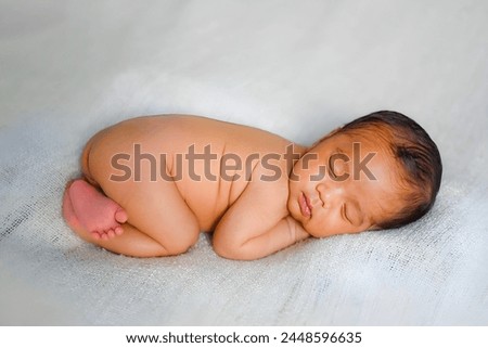cute asian baby boy poses in a photo shoot room in Jakarta, Indonesia