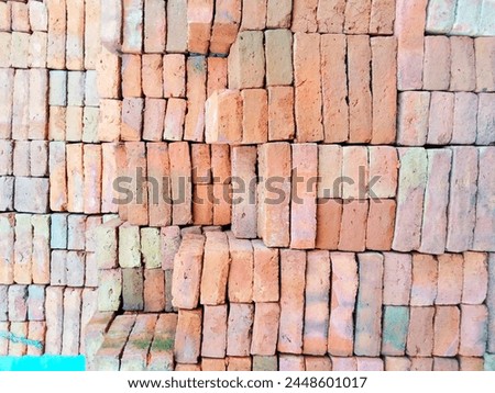 pile of red brick building materials