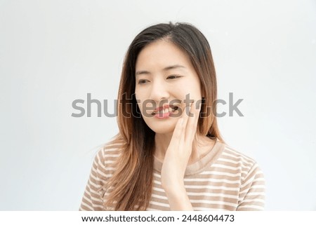 Asian woman feel toothache from gingivitis, female suffer tooth, decay problems, dental care. sensitive tooth, decay problem, bad breath, Gingival Recession, Oral Hygiene instruction, tooth extraction Royalty-Free Stock Photo #2448604473