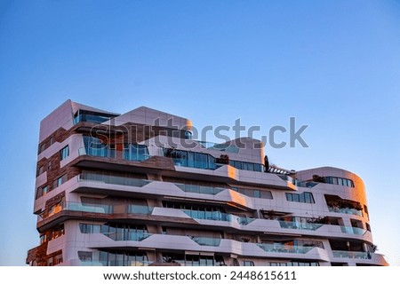 City Life in Milan, Italy. Modern Apartment Building against Clear Sky. Geometry in Architecture. Architectural Photography. Copy space.