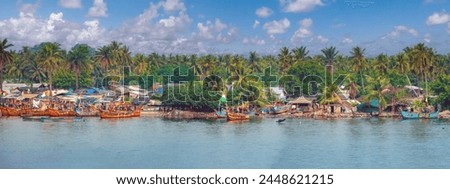 Traditional fishing villages lining the shores of the lagoons surrounding Abidjan, Côte d'ivoire (Ivory Coast), West Africa Royalty-Free Stock Photo #2448621215