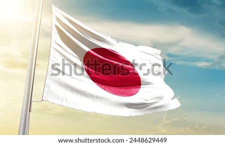 Japan national flag waving in beautiful sky.
