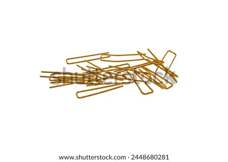 Staples from a stapler isolated on a white background
