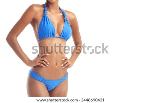 Body, care and stomach of girl with bikini in studio for wellness, detox or diet progress and results on white background. Swimwear, WEIGHT LOSS or model belly confident with vacation swimsuit choice