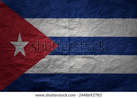 colorful big national flag of cuba on a grunge old paper texture background