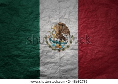 colorful big national flag of mexico on a grunge old paper texture background