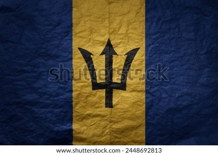 colorful big national flag of barbados on a grunge old paper texture background