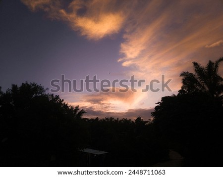 photography of a beautiful evening sky with orange sunlight