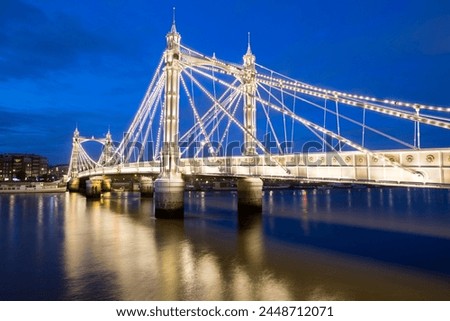 Albert Bridge and River Thames at night, Chelsea, London, England, United Kingdom, Europe
