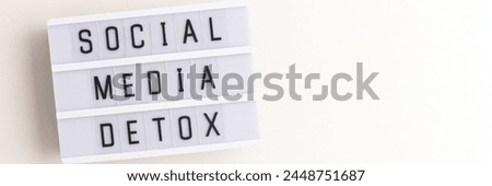 Social media detox. Banner with lightbox on a gray background with copy space.