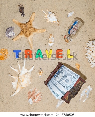 Money for travel, journey, vacation, rest, holiday, dream, travel. A well-deserved vacation at an expensive seaside resort. Chest with dollars on the beach. The inscription in on the sand "Journey" Royalty-Free Stock Photo #2448768505