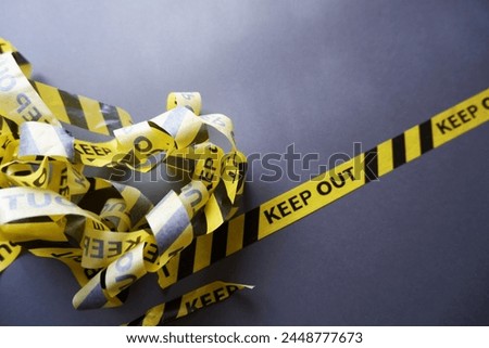 Keep out, police line on dark background. Caution lines isolated. Warning tapes. Danger signs.