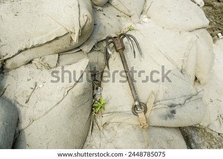 Grappling hook black, hook, grappling, sign, icon, symbol, element, object, illustration, grapple, silhouette, anchor, vintage, nautical, heavy, equipment, metal, climbing, Royalty-Free Stock Photo #2448785075