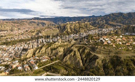 La Paz, Bolivia, aerial view flying over the dense, urban cityscape. San Miguel, southern distric. South America Royalty-Free Stock Photo #2448820129