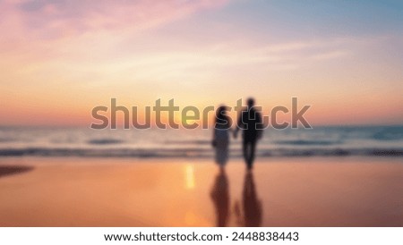 Defocus abstract blurred background image of couple at sunset beach