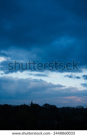 dark blue cloudy sky background