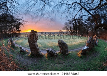 The King's Men stone circle at sunrise, The Rollright Stones, Chipping Norton, Cotswolds, Oxfordshire, England, United Kingdom, Europe Royalty-Free Stock Photo #2448876063