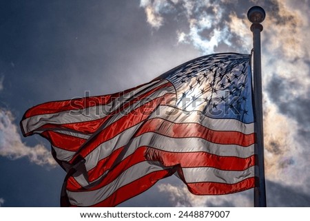 Waving american flag on sky background. Grunge American flag. US flag and sunrise. Independence day. USA flag, stars and stripes, united states of America.