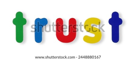 trust word in coloured magnetic letters