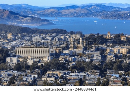 Cityscape seen from the St. Mary's Medical Center, St. Ignatius Church, and Twin Peaks: San Francisco, CA, USA Royalty-Free Stock Photo #2448884461
