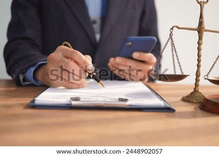Male lawyer, skilled in jurisprudence, navigates legal matters, drafting contracts, advising clients, representing in court. Law ensures justice, balancing rights and responsibilities