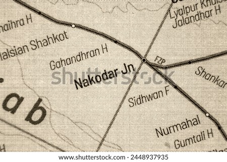 Nakodar - India Railways junction train station in atlas map town or city name in sepia