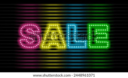 Big bright letters SALE glowing with neon colorful LEDs on a black wall