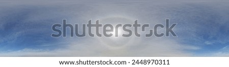 clear blue sky with halo sun in 360 hdri panorama view with zenith in seamless equirectangular spherical projection,  for use in 3d graphics or game development as sky dome or edit drone shot