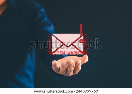 Male hand showing dangerous email icon Internet spam emails, hackers