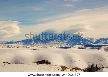 Beautiful landscape with a view of Elbrus while traveling around Russia in winter.