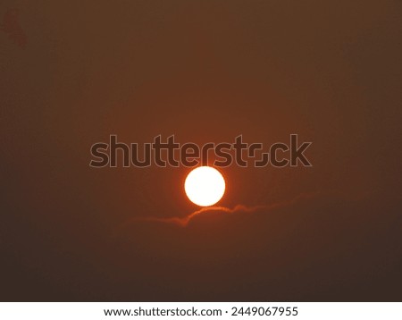 dusky view of the setting sun during sunset in the evening Royalty-Free Stock Photo #2449067955