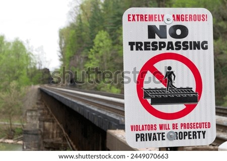 No Trespassing sign at Railroad Bridge Royalty-Free Stock Photo #2449070663