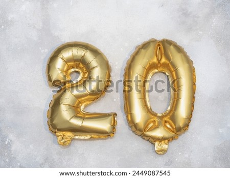 Numbers 2, 4, 20, gold balloons on a violet and grey background