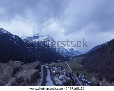 Mountain with snow, on top of a mountain. Forest with the city. Alps, Austria, walking. High quality photo