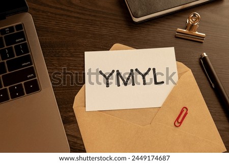There is word card with the word YMYL. It is an abbreviation for Your Money or Your Life as eye-catching image.