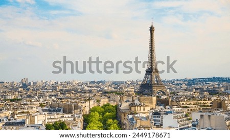 A beautiful picture of the Eiffel Tower in Paris, the capital of France, with a wonderful background in wonderful natural colors