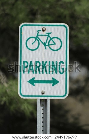 Bike parking sign at a public park