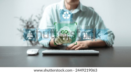 Business industry is increasingly adopting sustainable practices to reduce carbon emissions and preserve the ecology of the Earth, emphasizing the importance of eco-friendly energy solutions. Royalty-Free Stock Photo #2449219063