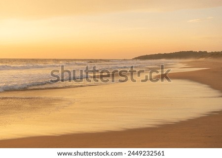 picture of sea waves and sunset