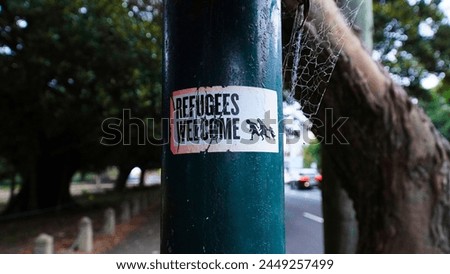 Refugees welcome sign.
signs refugees not welcome. Sydney NSW Australia