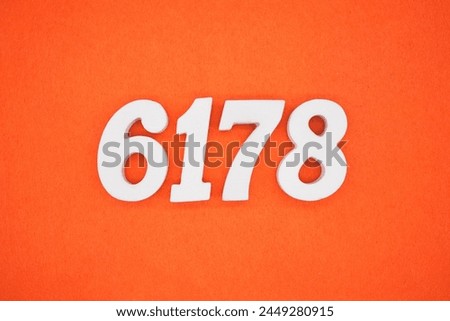Orange felt is the background. The numbers 6178 are made from white painted wood.